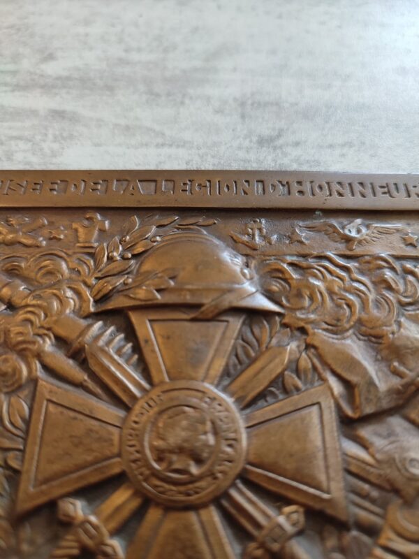 adrian helmet on croix de guerre plate